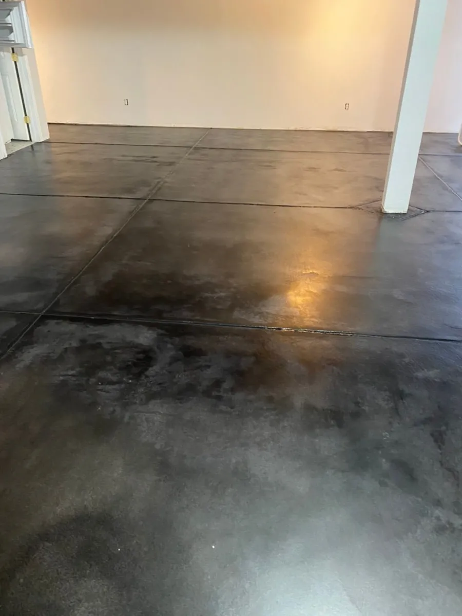 Polished concrete floor with columns in a commercial interior